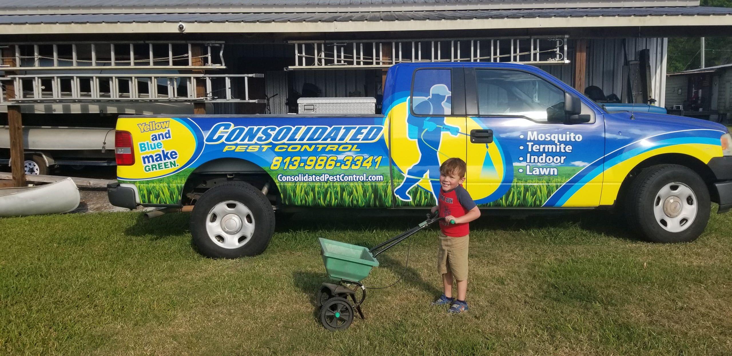 Homeowner learning how to apply Hydretain to a green Tampa lawn